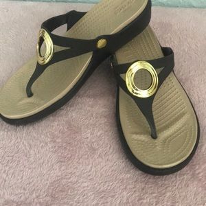 Crocs Brown wedge with gold accents